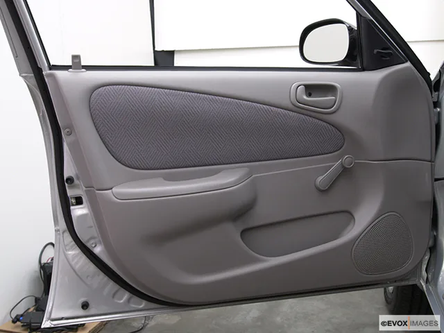 2001 Chevrolet Prizm Inside of driver's side open door, window open