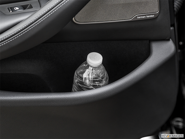 2021 BMW M5 Second row side cup holder with coffee prop, or second row door cup holder with water bottle